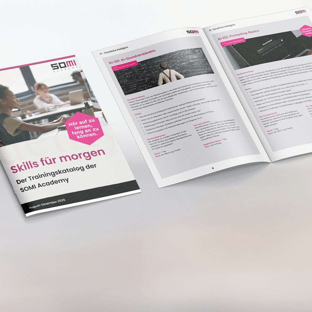 A smiling, dark-haired man looks into the camera from the left, with an open SOMI Academy trainings catalog labeled “Skills for Tomorrow” in the foreground.